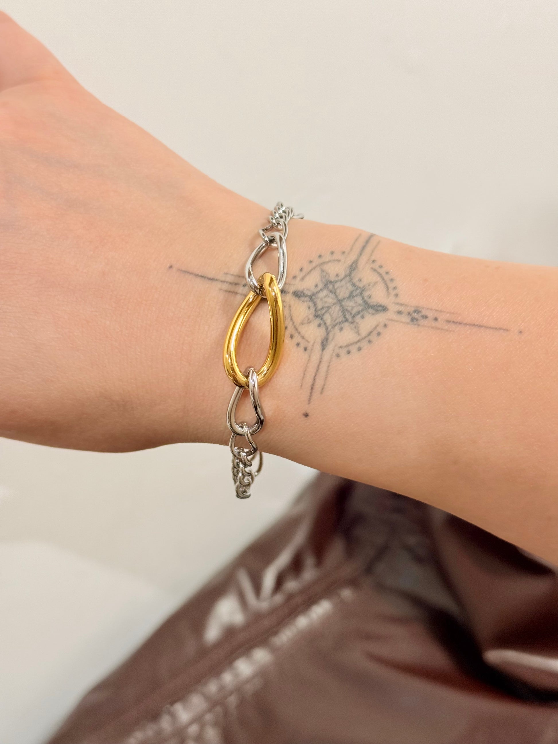 Mix tone interlock stainless steel bracelet
