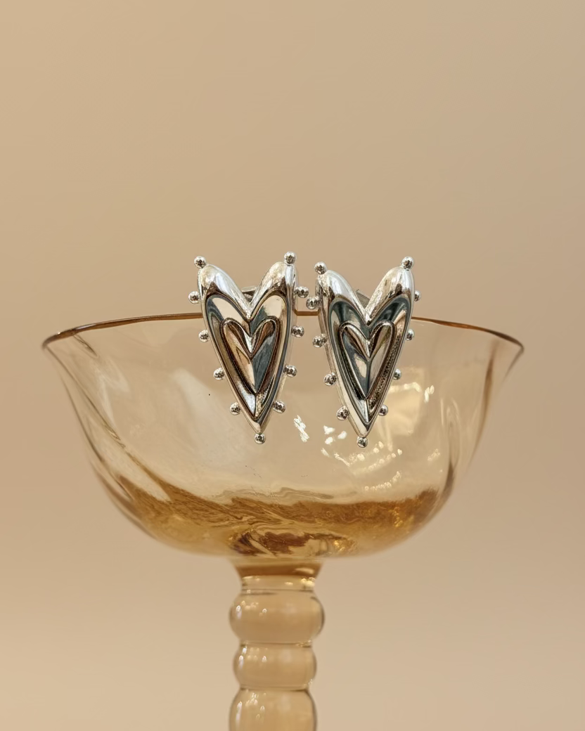 Spiked long heart earrings