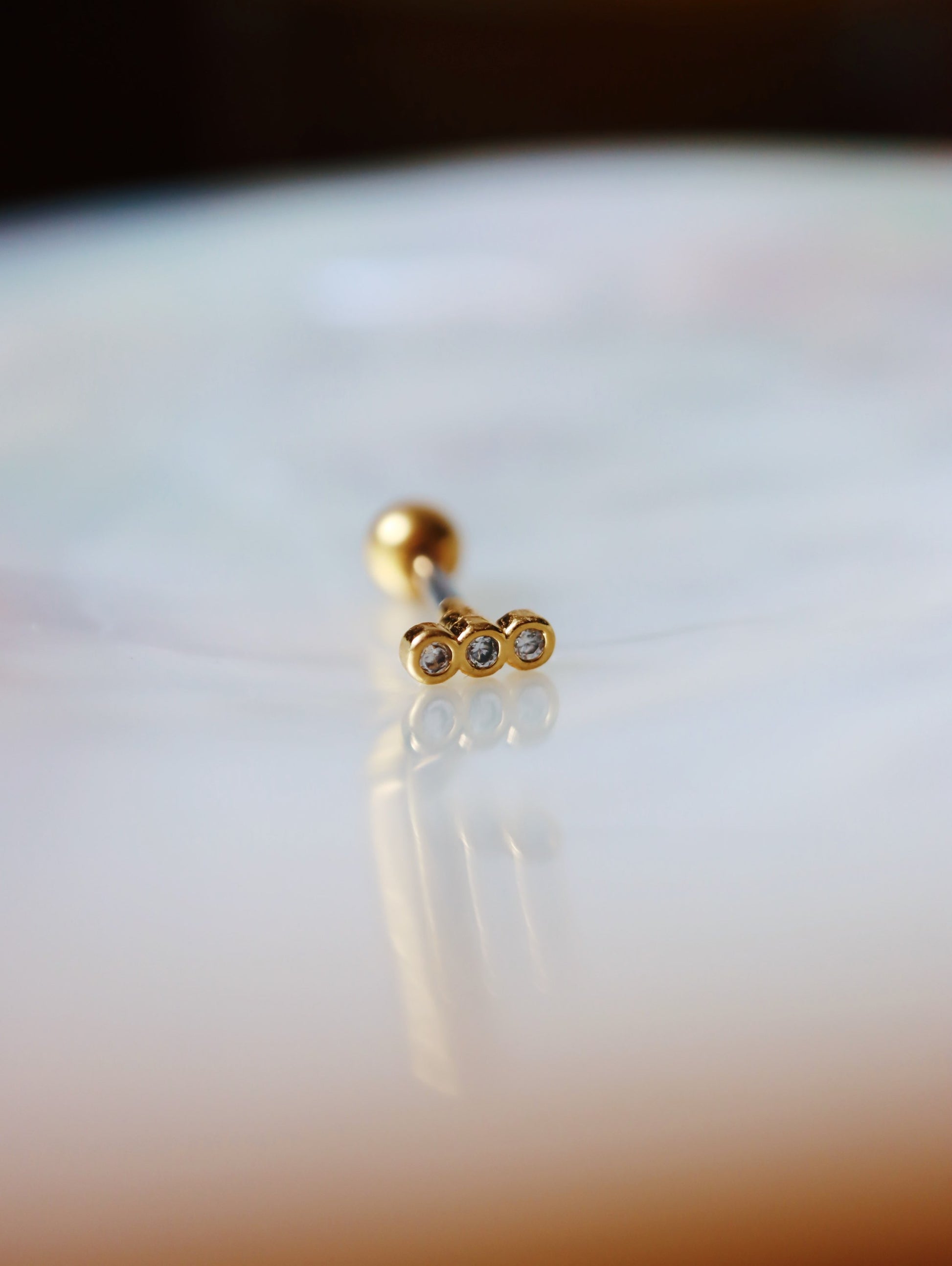 Triple cz stud bar screw back earring