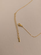 Crescent pearl brass necklace