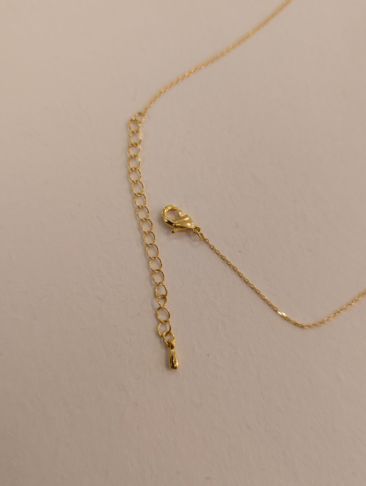 Crescent pearl brass necklace