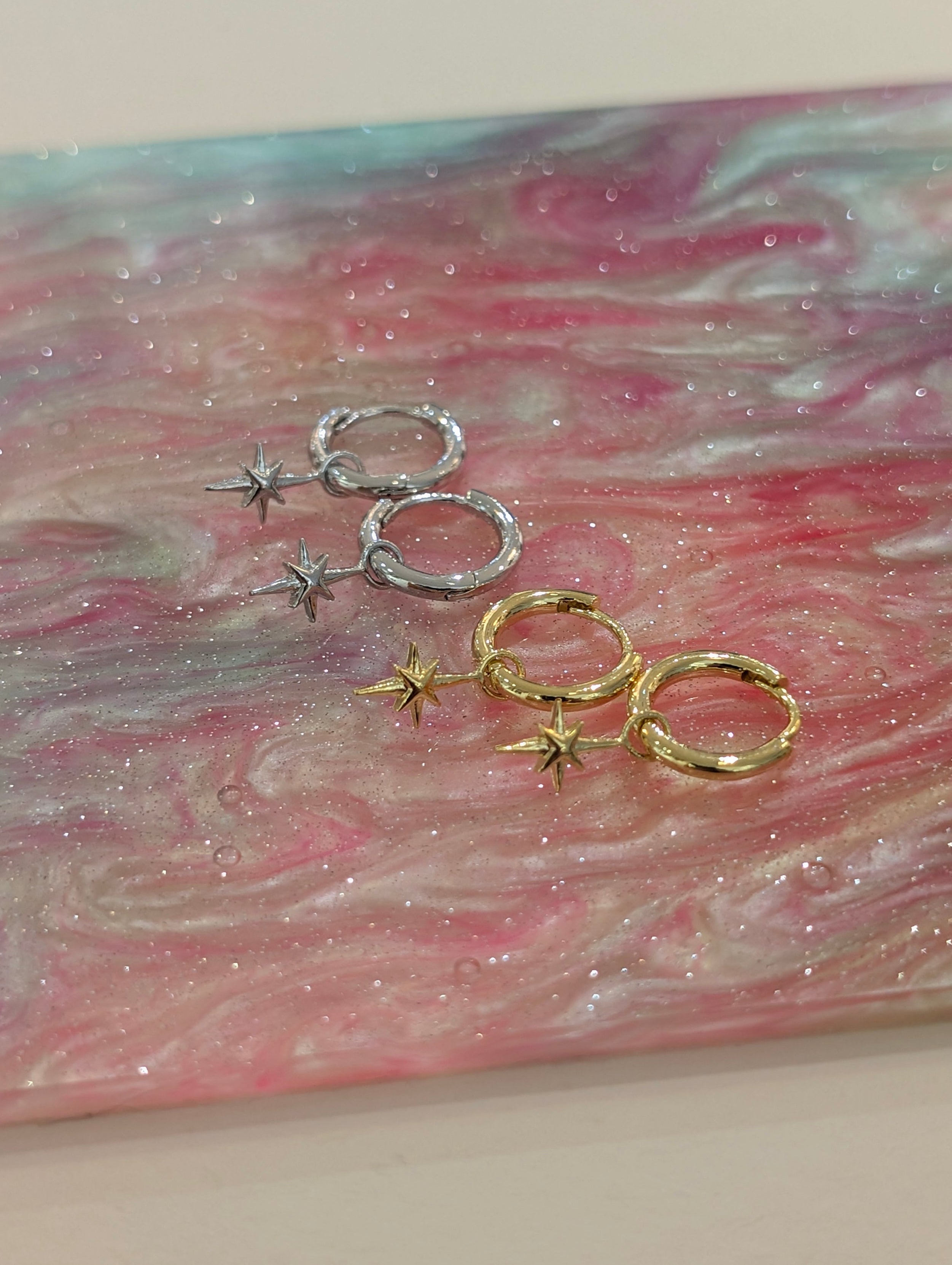 Hinged hoop drop starburst earrings