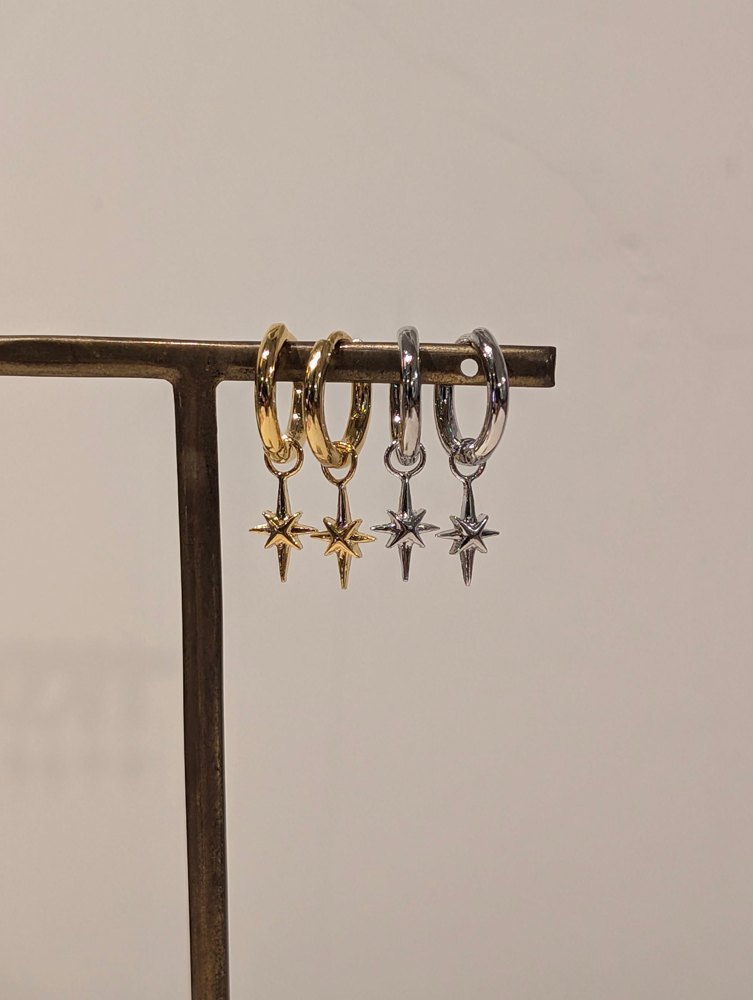Hinged hoop drop starburst earrings