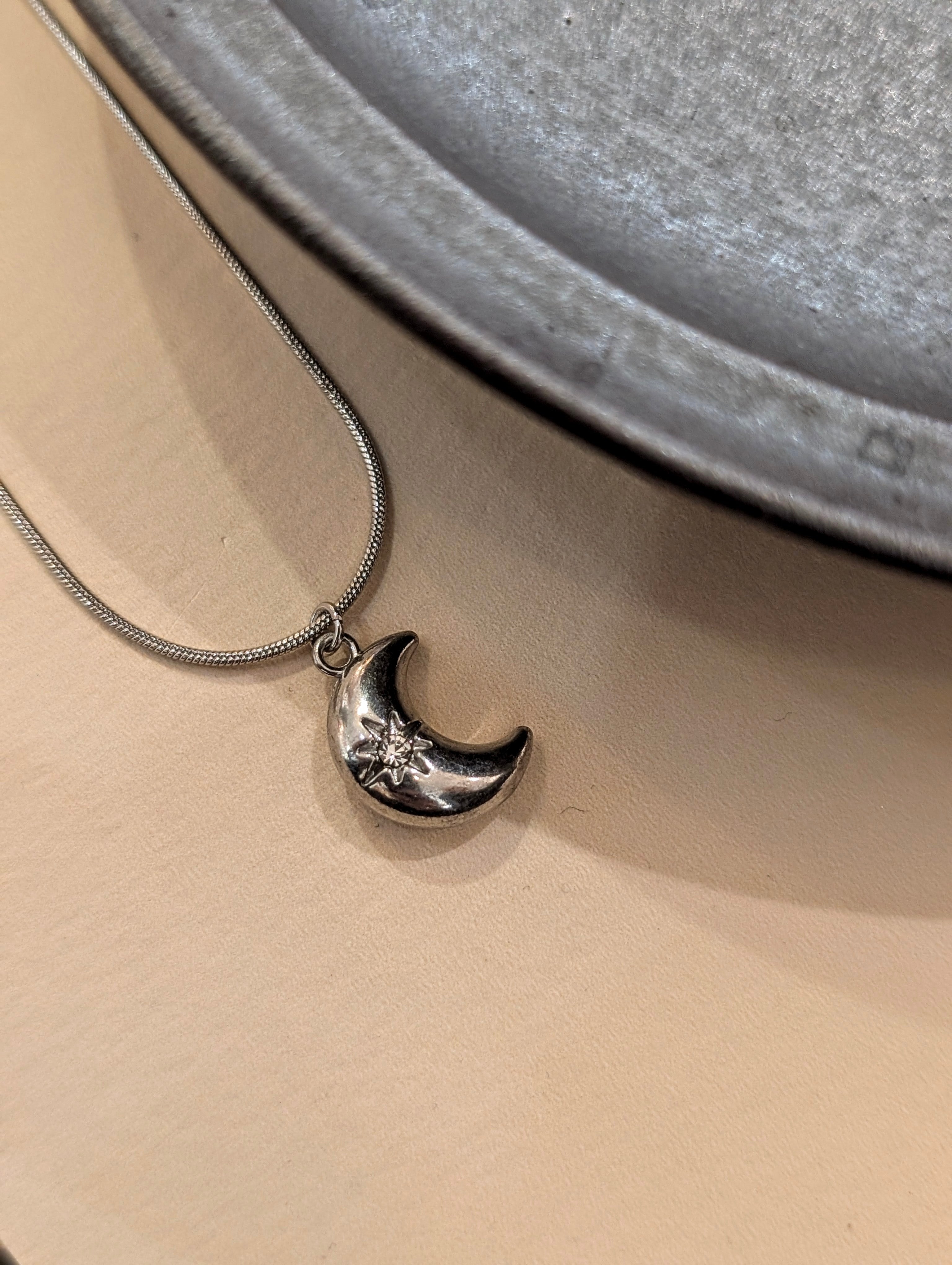 Crescent cz stud stainless steel necklace