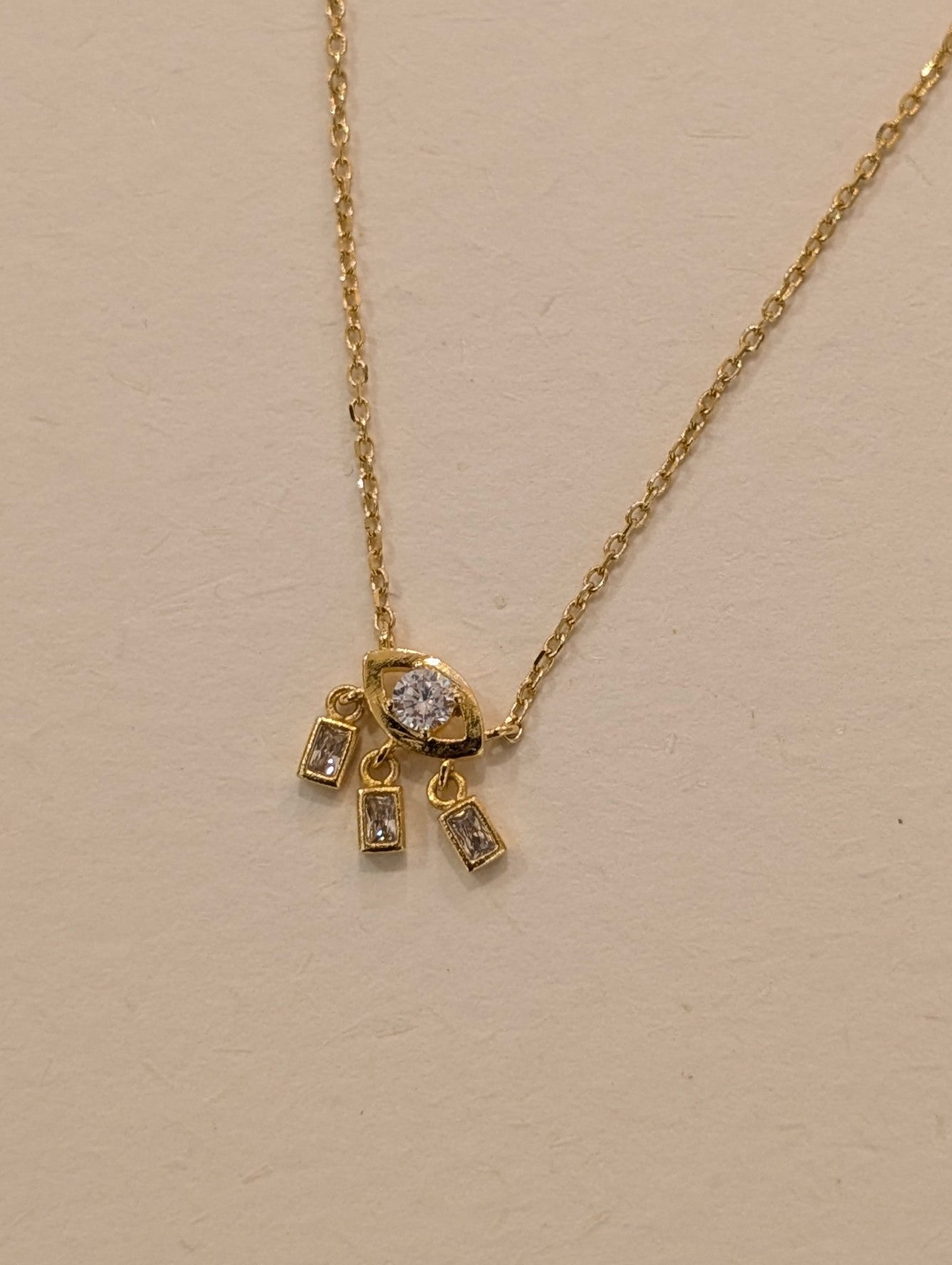 Eye drop cz brass necklace