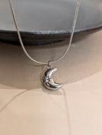 Crescent cz stud stainless steel necklace