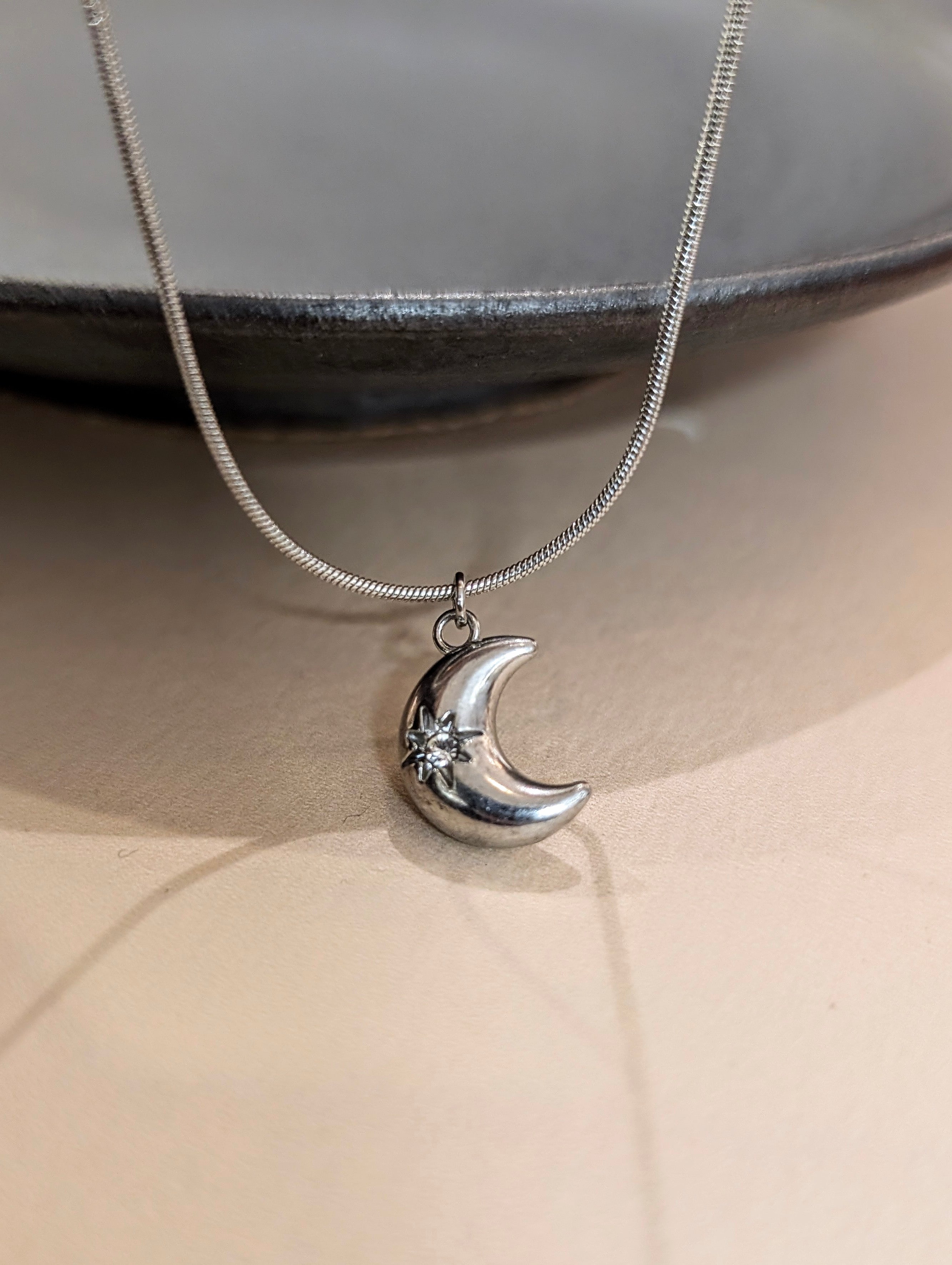 Crescent cz stud stainless steel necklace