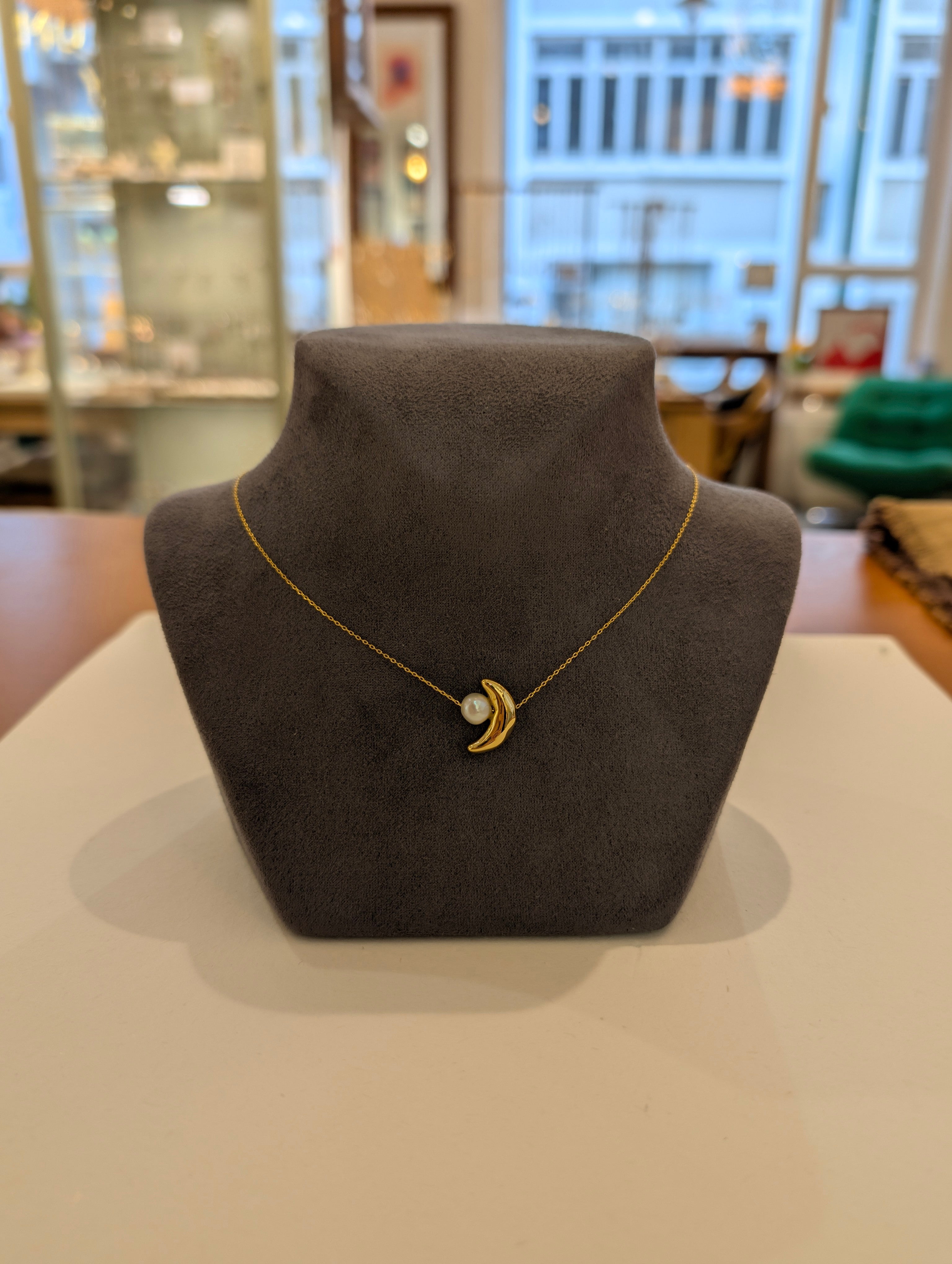 Crescent pearl brass necklace
