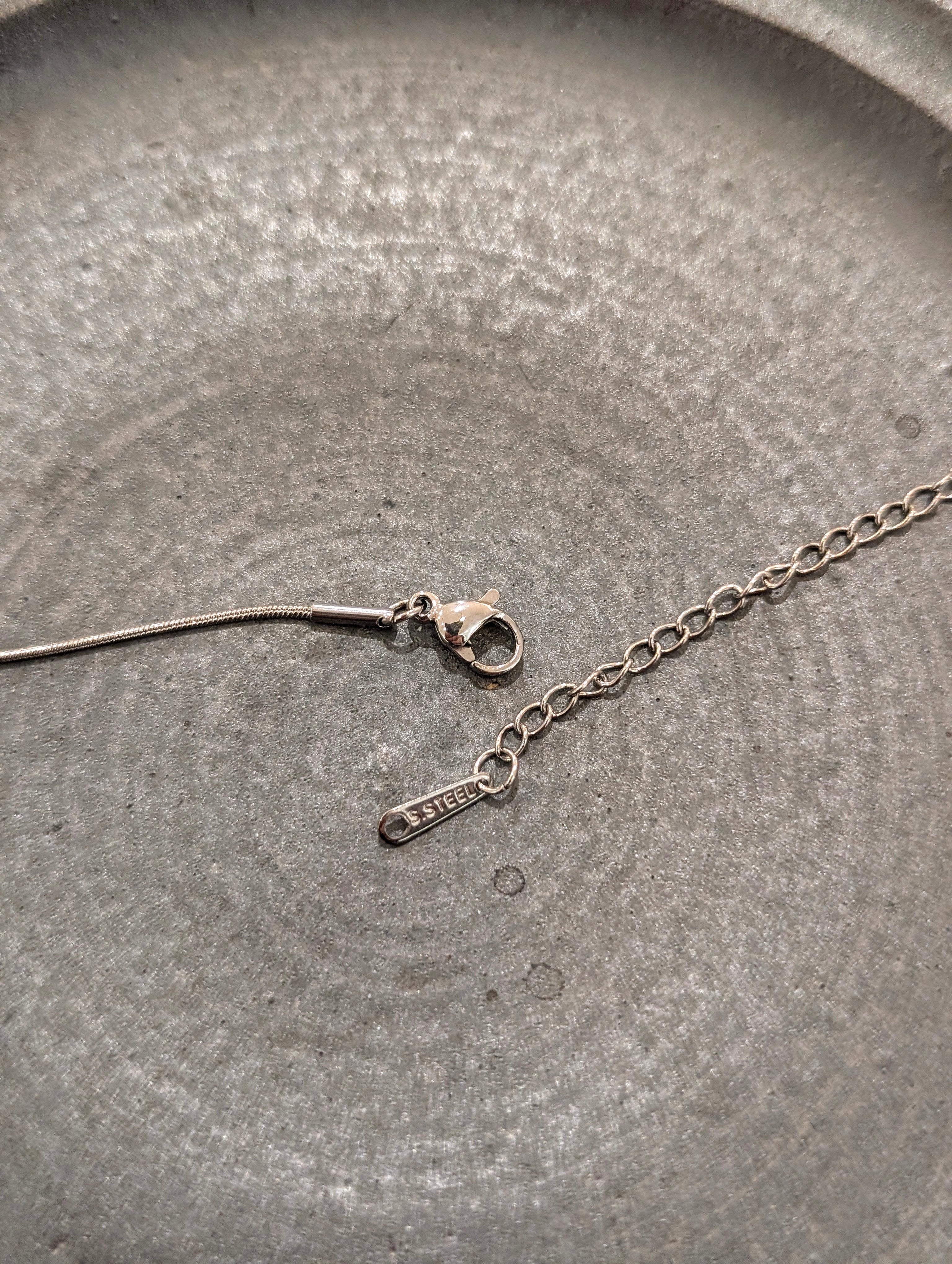 Crescent cz stud stainless steel necklace