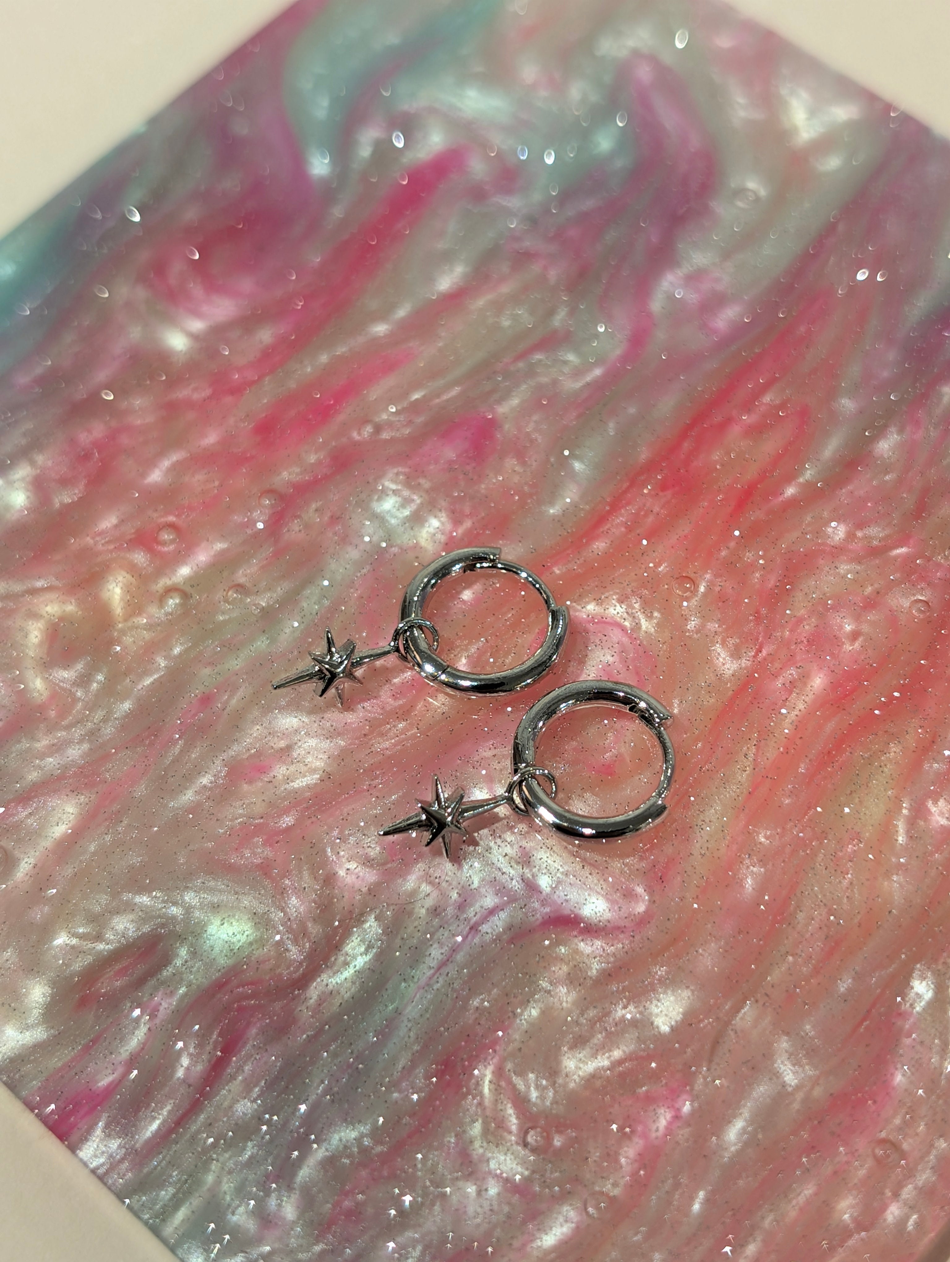 Hinged hoop drop starburst earrings