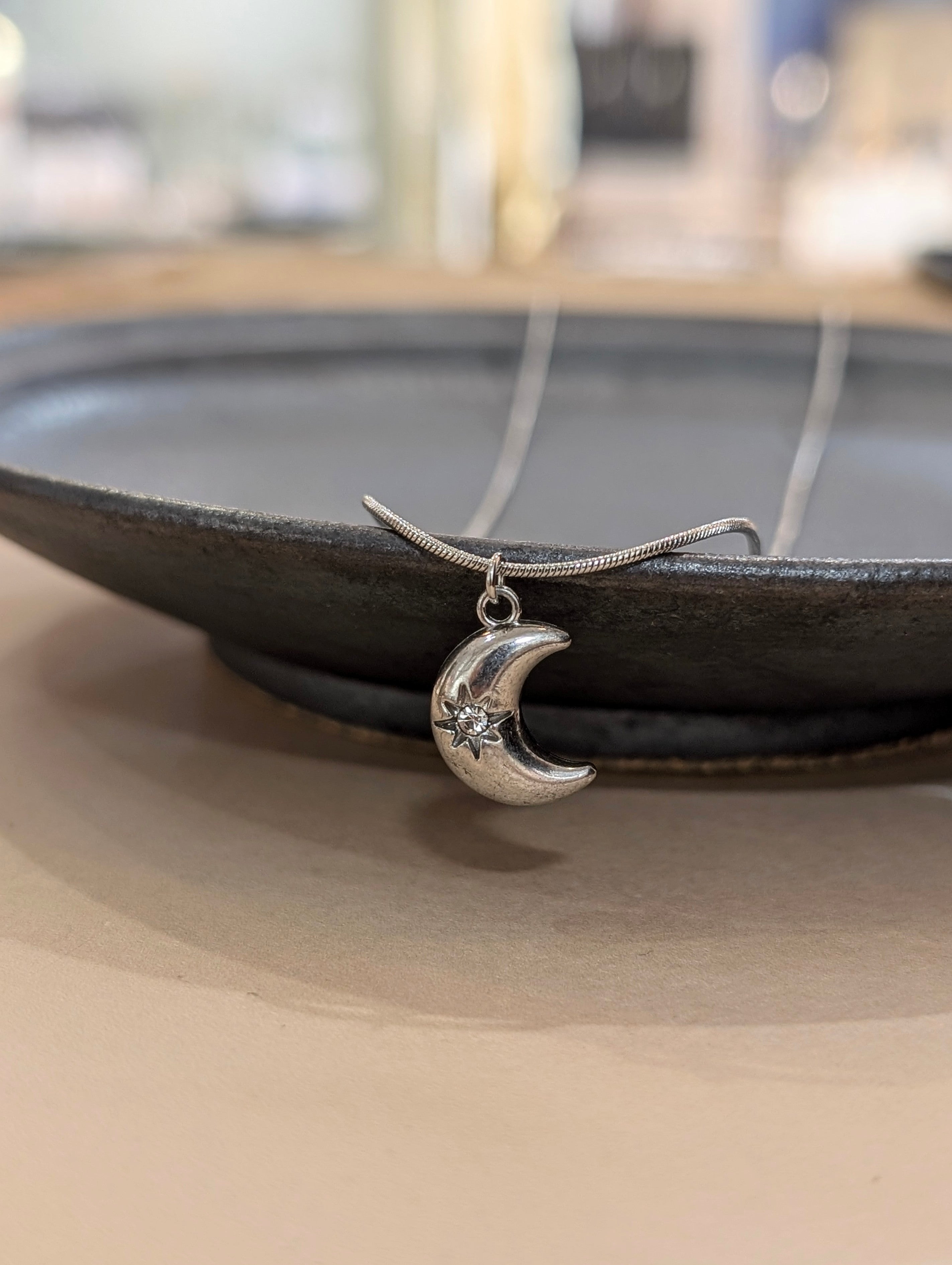 Crescent cz stud stainless steel necklace