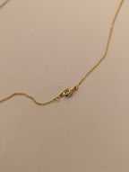 Eye drop cz brass necklace