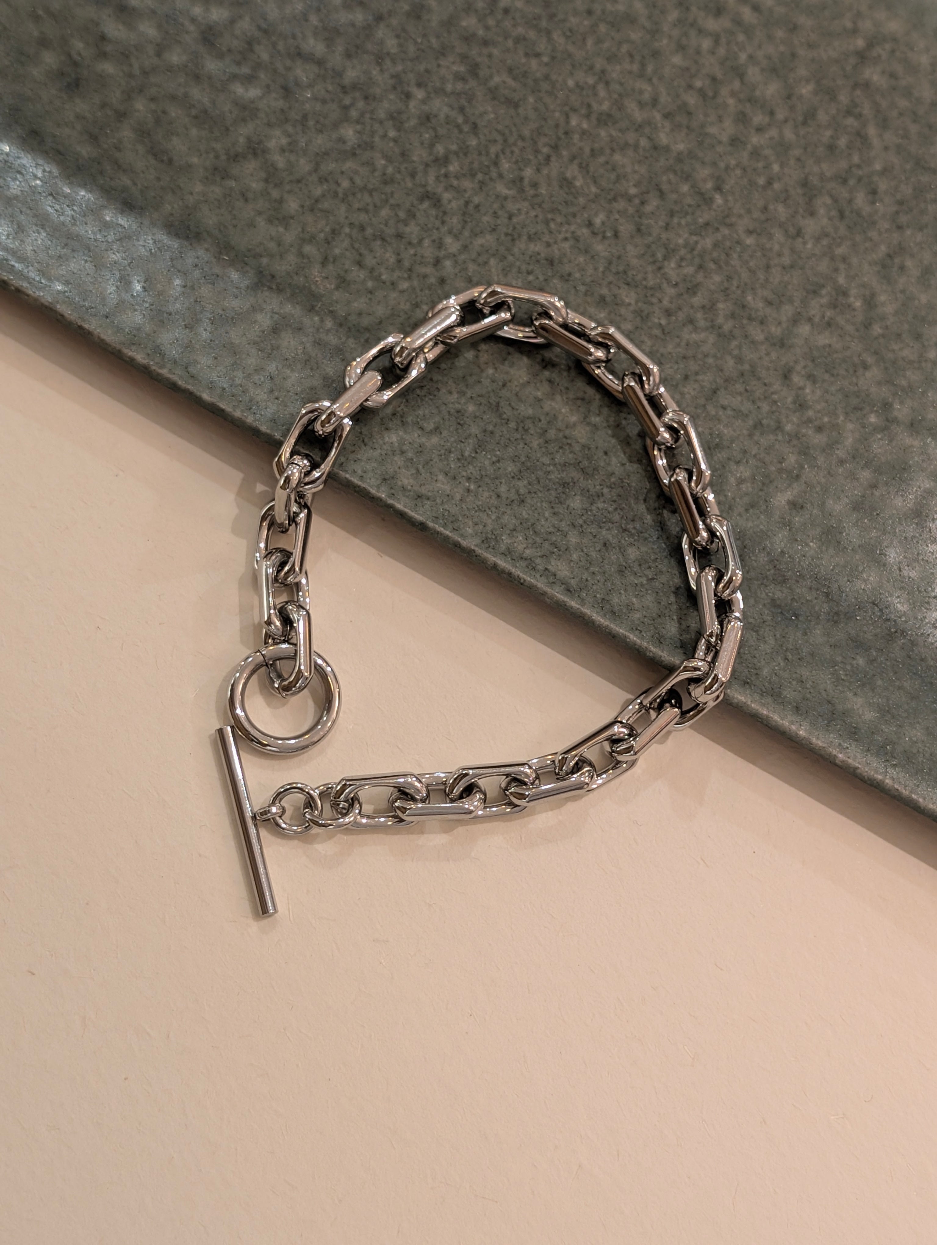 Interlock front lock stainless steel bracelet