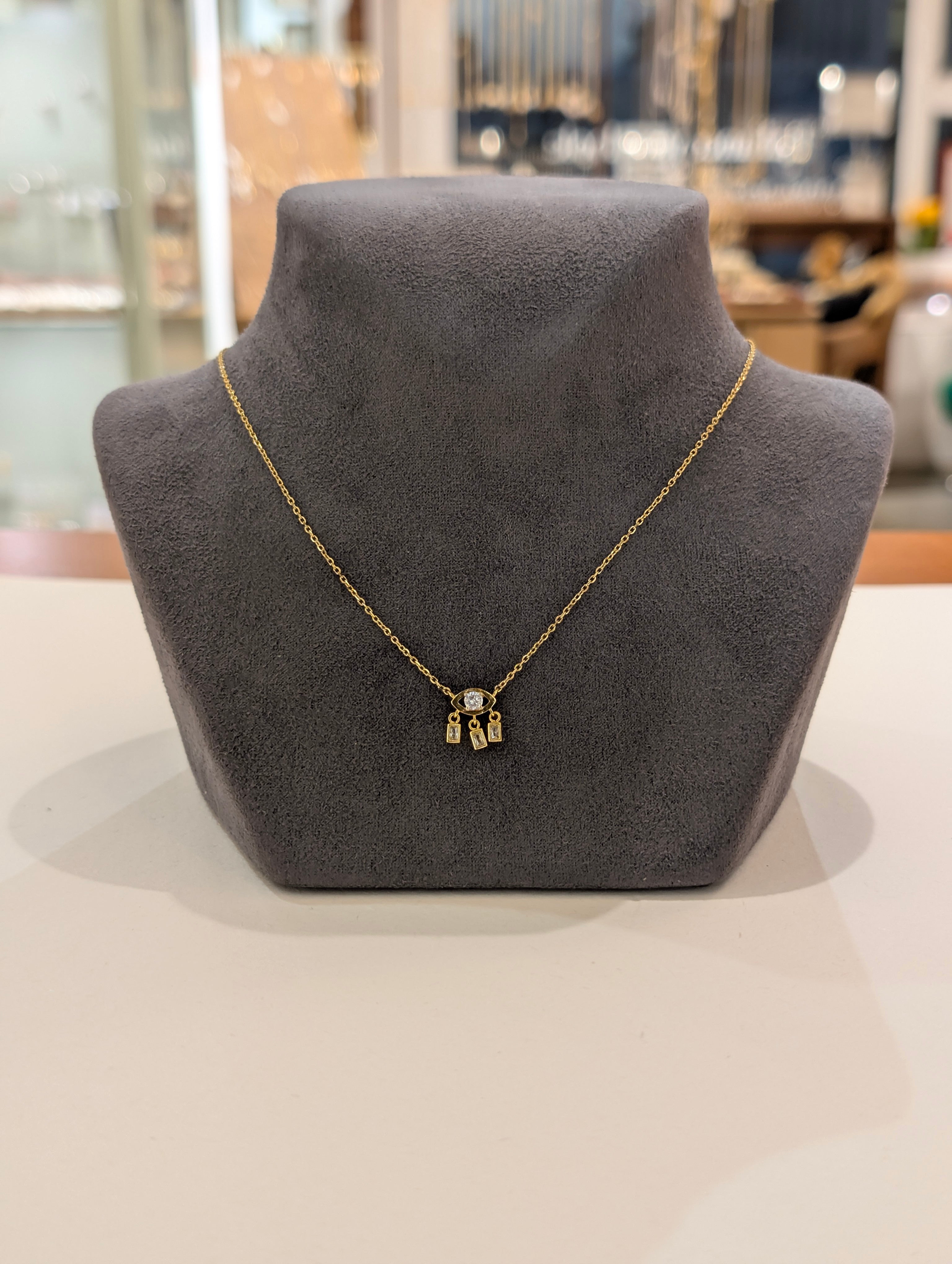 Eye drop cz brass necklace