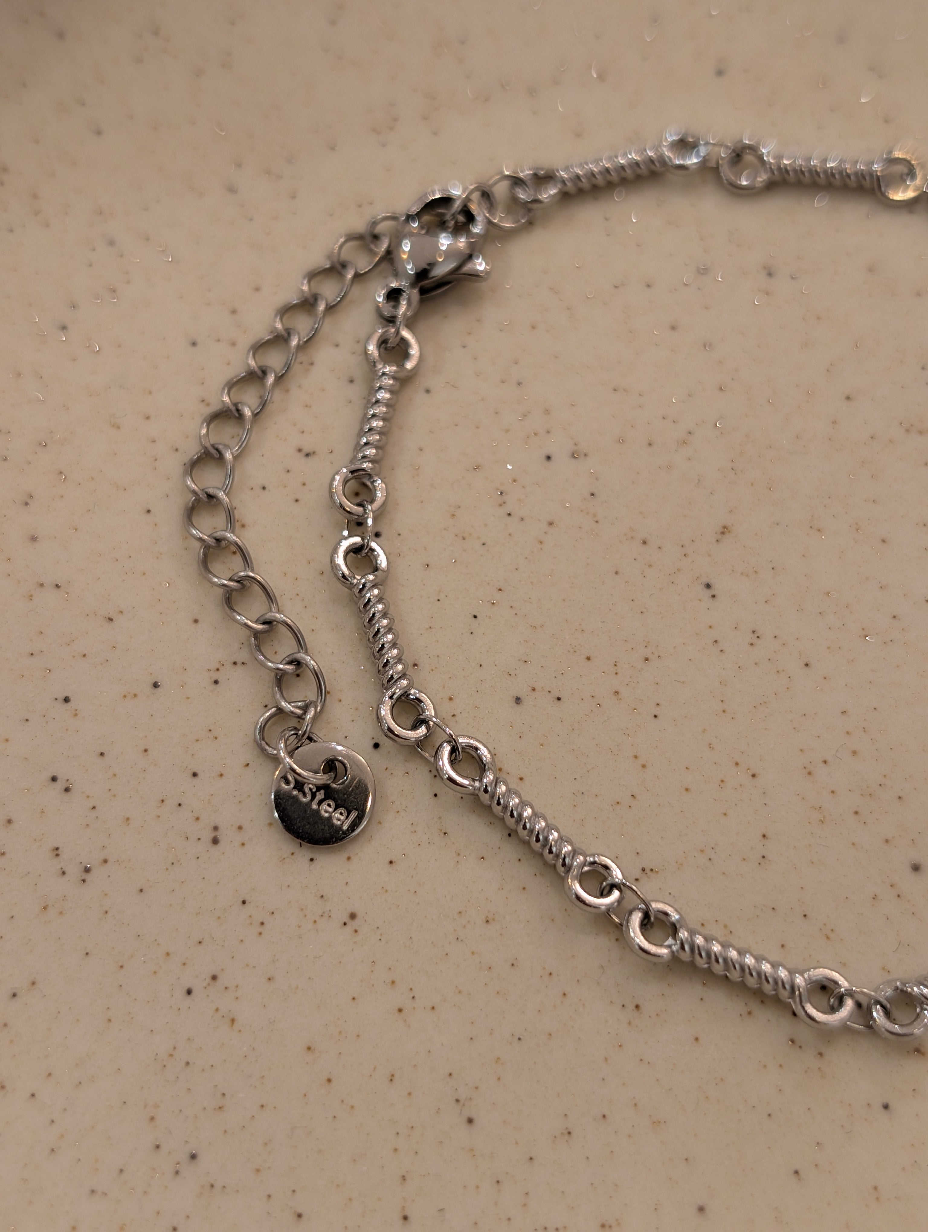 Interlock stainless steel bracelet