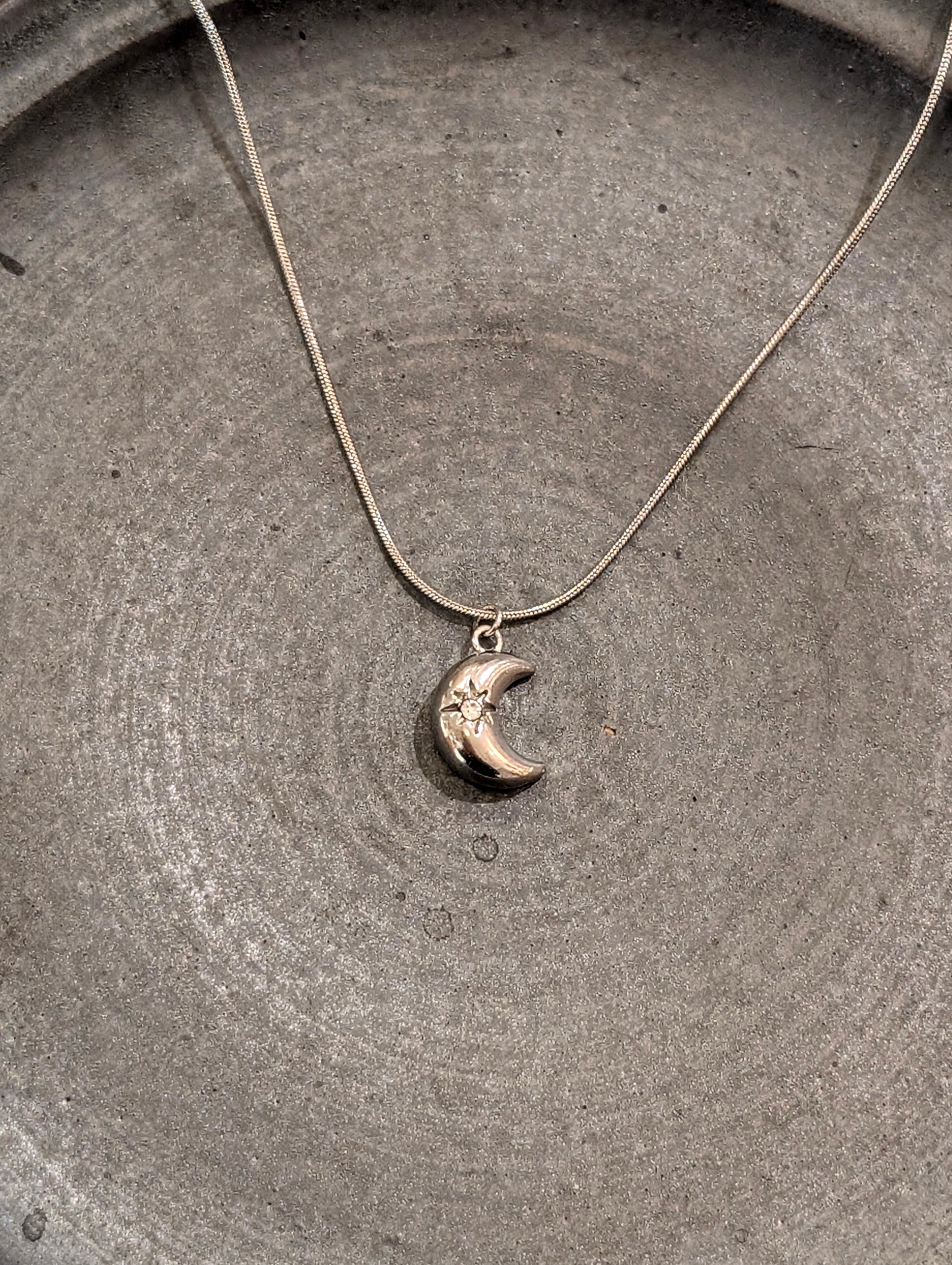 Crescent cz stud stainless steel necklace